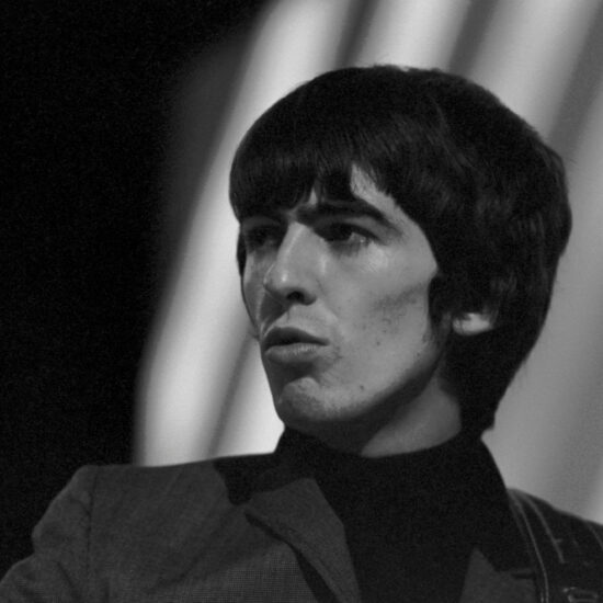 George Harrison of the Beatles in profile close-up during a rehearsal for ABC's TV show 'Thank Your Lucky Stars', Teddington Studios in 1964